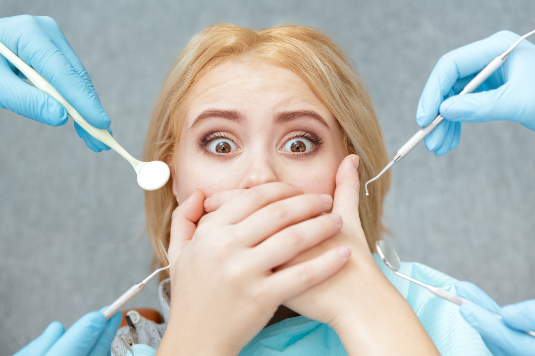 woman afraid of dentist