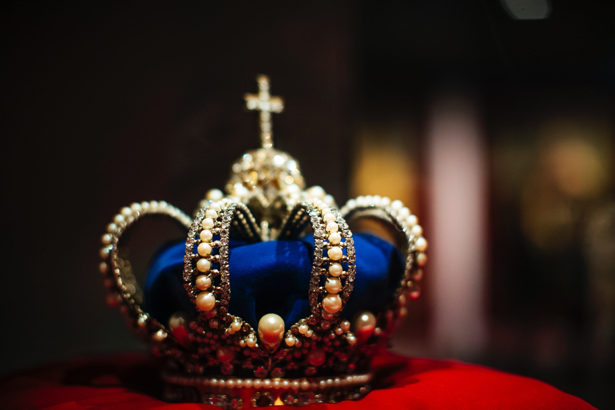 blue crown on red velvet