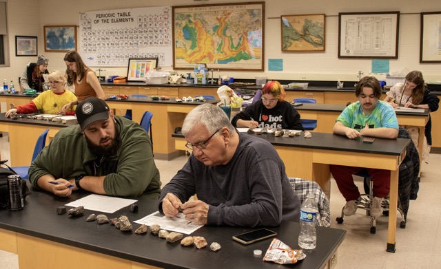 The Geology Club works on an igneous rock identification activity
