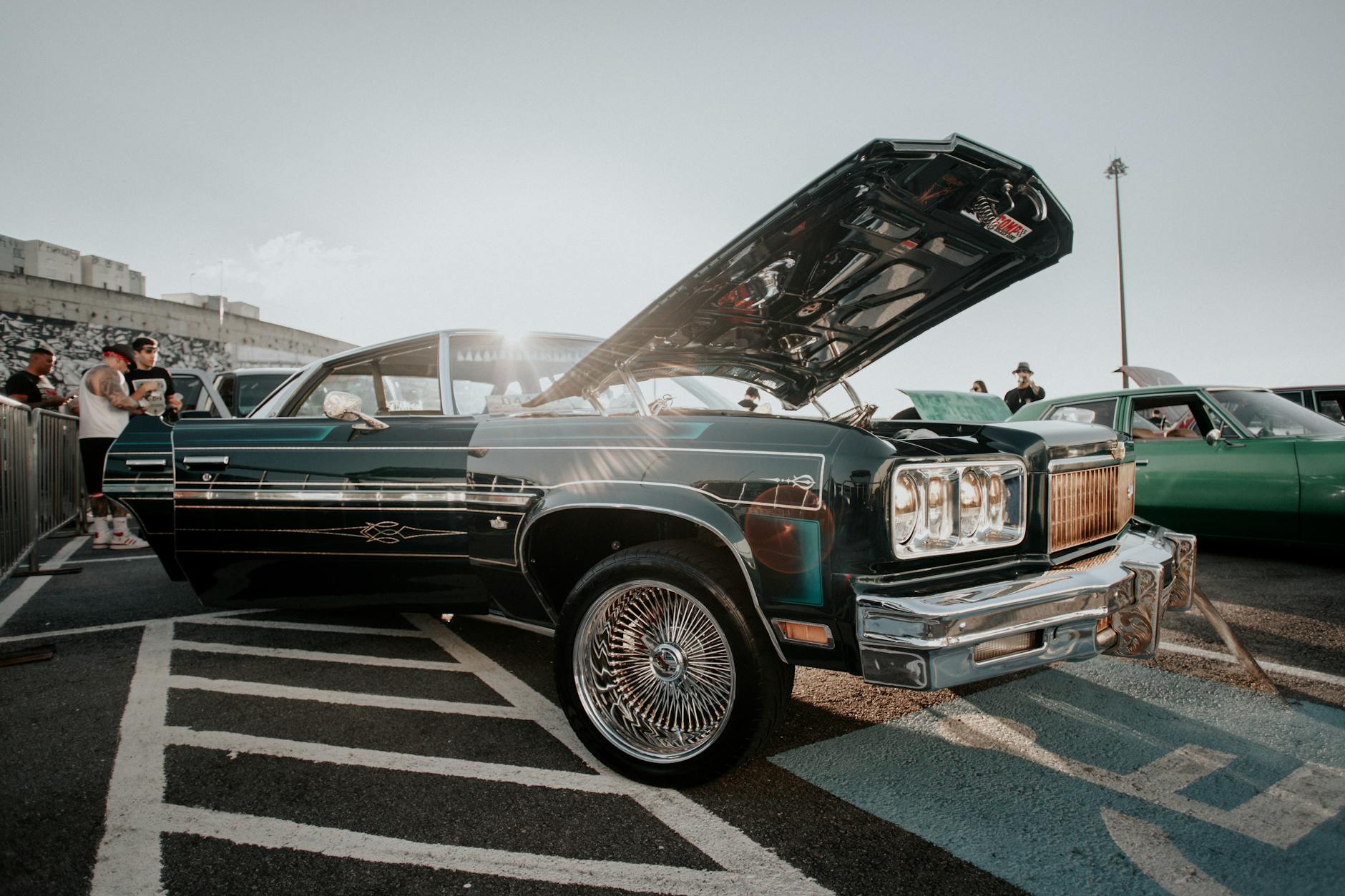 old car with open doors and the hood