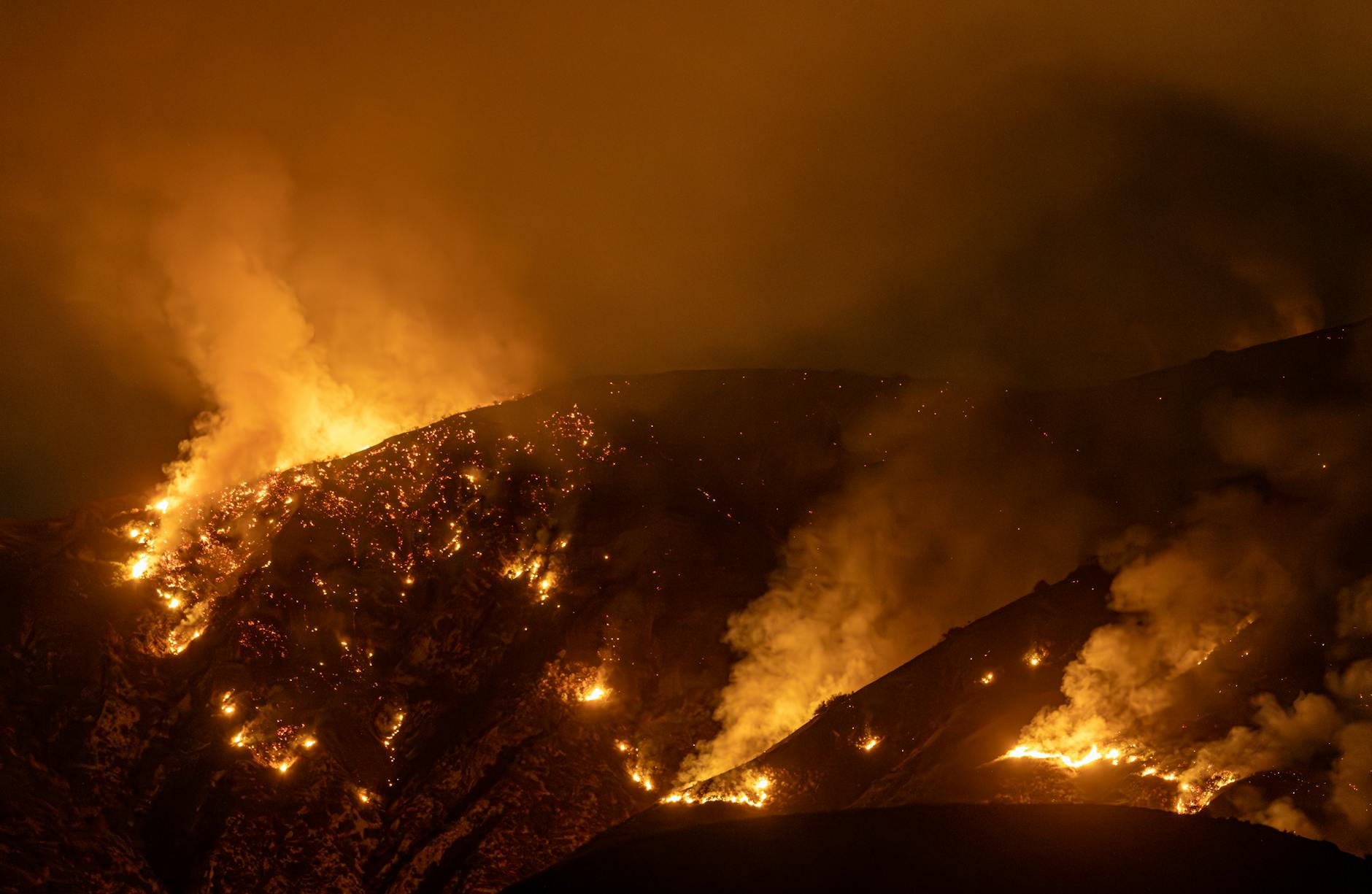 dramatic nighttime forest fire in california